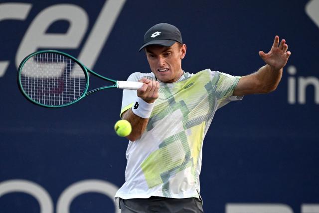 Australia's Tristan Schoolkate returns the ball to China's Yibing Wu during the Mexico ATP Open men's singles tennis match at the Cabo Sports Complex in Los Cabos, Baja California, Mexico on July 15, 2025. (Photo by Alfredo ESTRELLA / AFP)