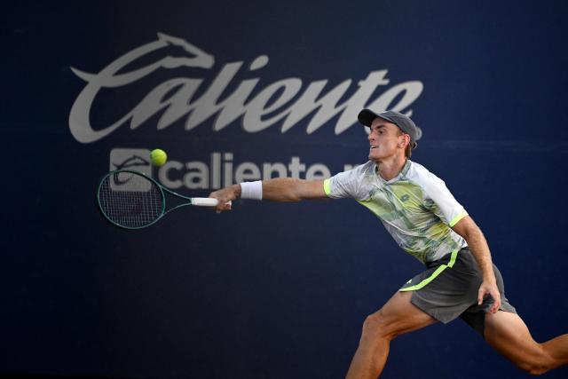Australia's Tristan Schoolkate returns the ball to China's Yibing Wu during the Mexico ATP Open men's singles tennis match at the Cabo Sports Complex in Los Cabos, Baja California, Mexico on July 15, 2025. (Photo by Alfredo ESTRELLA / AFP)