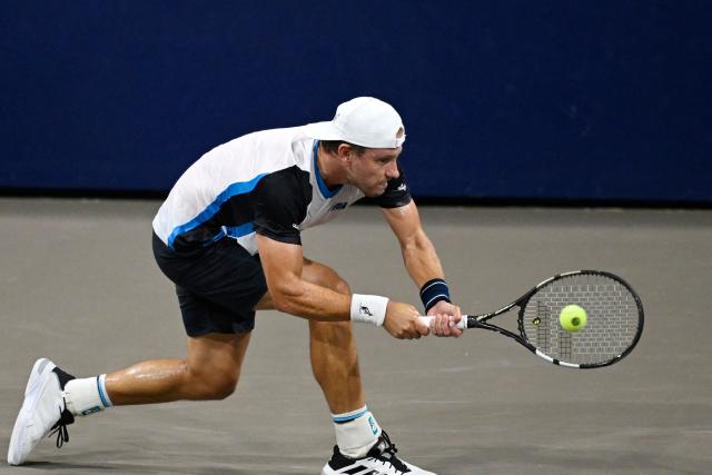 Australia's James Duckworth returns the ball to France's Adrian Mannarino during the Mexico ATP Open men's singles tennis match at the Cabo Sports Complex in Los Cabos, Baja California, Mexico on July 15, 2025. (Photo by Alfredo ESTRELLA / AFP)