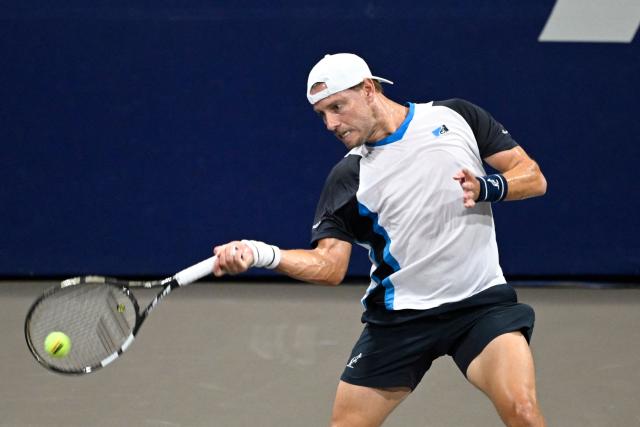 Australia's James Duckworth returns the ball to France's Adrian Mannarino during the Mexico ATP Open men's singles tennis match at the Cabo Sports Complex in Los Cabos, Baja California, Mexico on July 15, 2025. (Photo by Alfredo ESTRELLA / AFP)