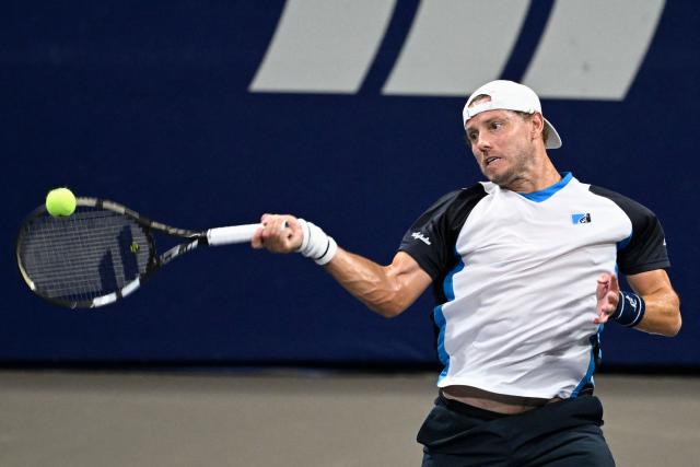 Australia's James Duckworth returns the ball to France's Adrian Mannarino during the Mexico ATP Open men's singles tennis match at the Cabo Sports Complex in Los Cabos, Baja California, Mexico on July 15, 2025. (Photo by Alfredo ESTRELLA / AFP)