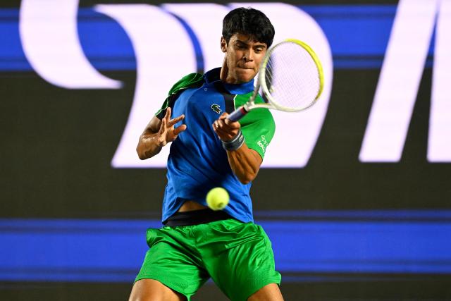 Mexico's Rodrigo Pacheco returns the ball to Australia's Adam Walton during the Mexico ATP Open men's singles tennis match at the Cabo Sports Complex in Los Cabos, Baja California, Mexico on July 15, 2025. (Photo by Alfredo ESTRELLA / AFP)