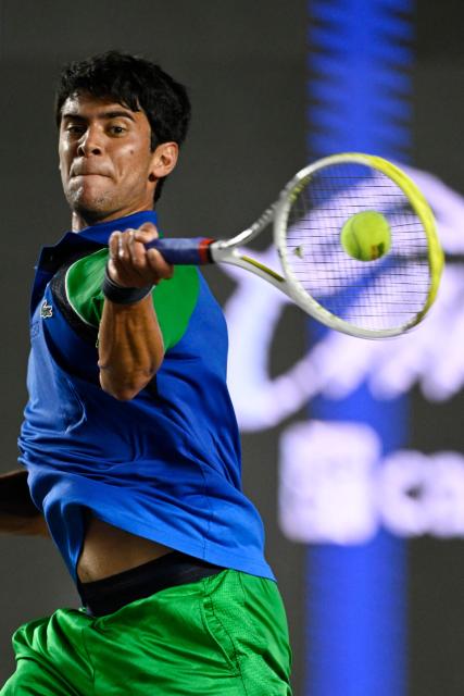 Mexico's Rodrigo Pacheco returns the ball to Australia's Adam Walton during the Mexico ATP Open men's singles tennis match at the Cabo Sports Complex in Los Cabos, Baja California, Mexico on July 15, 2025. (Photo by Alfredo ESTRELLA / AFP)