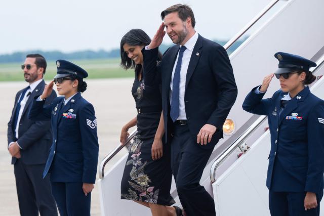 US Vice President JD Vance and his wife Usha Vance step off Air Force Two at Joint Base Andrews, Maryland, on July 16, 2025. Vance traveled to West Pittston, Pennsylvania, for an event touting the "One Big Beautiful Bill Act," containing spending and tax policies, recently passed by Congress and signed into law by President Donald Trump. (Photo by SAUL LOEB / POOL / AFP)
