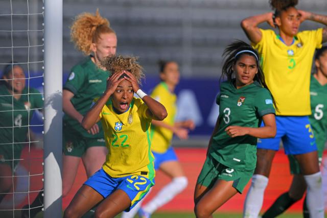 Brazil's forward #22 Luany da Silva reacts after missing a chance to score during the Women's Copa America 2025 football match between Bolivia and Brazil at the Gonzalo Pozo Ripalda stadium in Quito on July 16, 2025. (Photo by Rodrigo BUENDIA / AFP)