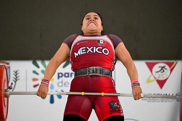 Mexico's Diana Garcia competes in the 69 kg category during the 2025 Pan American Weightlifting Championships at Miguel Calero Coliseum in Cali, Colombia on July 16, 2025. (Photo by JOAQUIN SARMIENTO / AFP)
