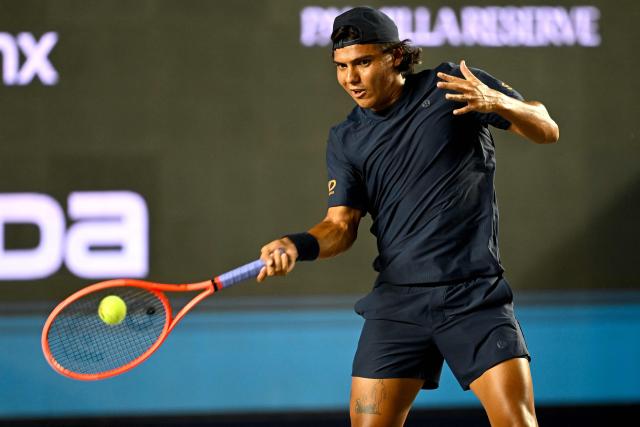 Mexico's Alex Hernandez returns the ball to Russia's Andrey Rublev during the Mexico ATP Open men's singles tennis match at the Cabo Sports Complex in Los Cabos, Baja California, Mexico on July 16, 2025. (Photo by Alfredo ESTRELLA / AFP)