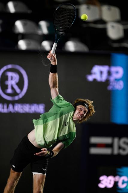 Russia's Andrey Rublev returns the ball to Mexico's Alex Hernandez during the Mexico ATP Open men's singles tennis match at the Cabo Sports Complex in Los Cabos, Baja California, Mexico on July 16, 2025. (Photo by Alfredo ESTRELLA / AFP)