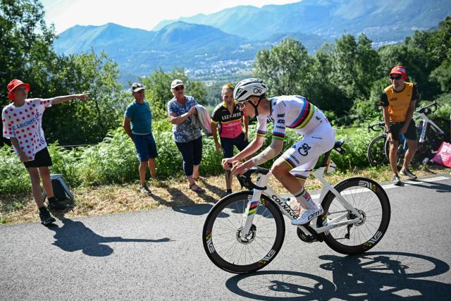 UAE Team Emirates - XRG team's Slovenian rider Tadej Pogacar cycles in the ascent of Hautacam during the 12th stage of the 112th edition of the Tour de France cycling race, 180.6 km between Auch and Hautacam, in the Pyrenees mountains of southwestern France, on July 17, 2025. (Photo by Loic VENANCE / AFP)