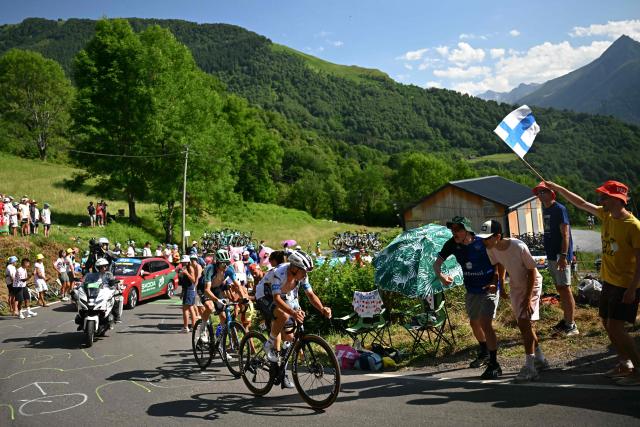 Soudal Quick-Step team's Belgian rider Remco Evenepoel cycles in the ascent of Col des Borderes during the 12th stage of the 112th edition of the Tour de France cycling race, 180.6 km between Auch and Hautacam, in the Pyrenees mountains of southwestern France, on July 17, 2025. (Photo by Loic VENANCE / AFP)