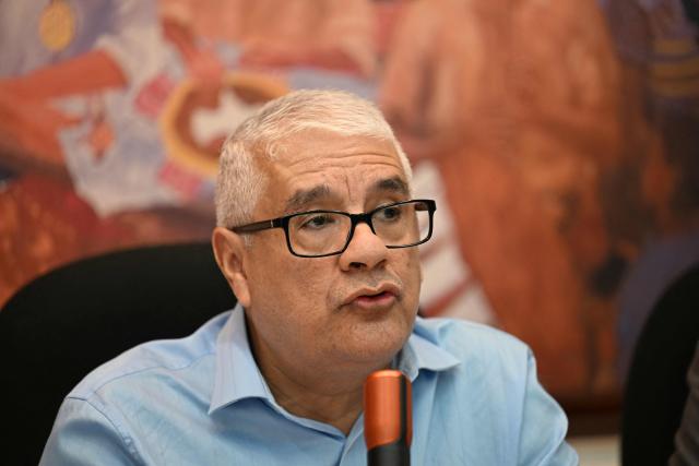 Abraham Abrego, director of the strategic litigation of the human rights group Cristosal, speaks during a press conference in Guatemala City, on July 17, 2025. NGO Cristosal, a leading rights group investigating corruption in El Salvador, said on July 17, 2025, it had been forced into exile due to "escalating repression" by President Nayib Bukele's administration. (Photo by JOHAN ORDONEZ / AFP)