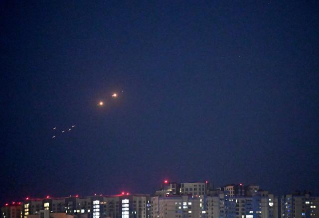 Ukrainian air defences deploy against Russian drones during a drone strike in Kyiv on July 18, 2025, amid the Russian invasion in Ukraine. (Photo by Sergei SUPINSKY / AFP)