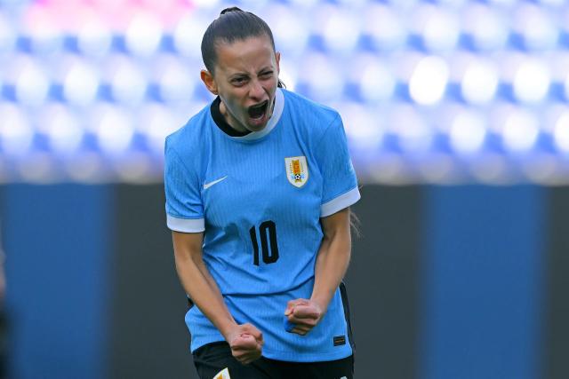 Uruguay's forward #10 Belen Aquino celebrates scoring his team's first goal during the Women's Copa America 2025 football match between Uruguay and Peru at the IDV stadium in Quito on July 18, 2025. (Photo by Rodrigo BUENDIA / AFP)