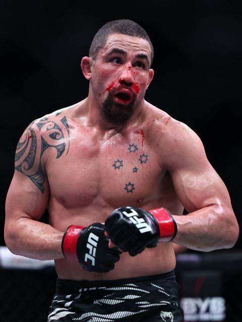 Australia and New Zealand's Robert Whittaker looks on as he competes against the Netherlands' Reinier de Ridder in their men's middleweight fight at the UFC Fight Night event at Etihad Arena in Abu Dhabi on July 26, 2025. (Photo by Fadel SENNA / AFP)