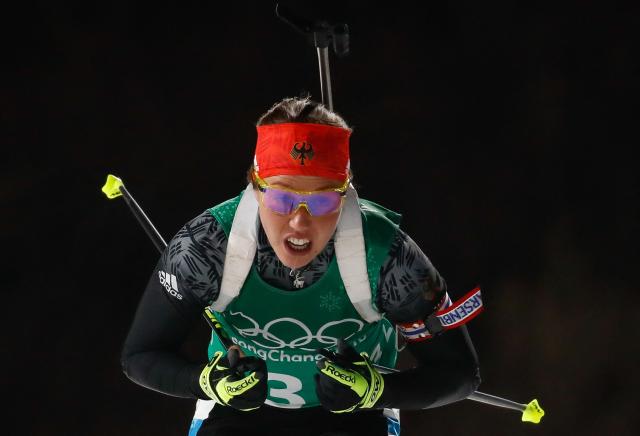 (FILES) Germany's Laura Dahlmeier competes in the mixed relay biathlon event during the Pyeongchang 2018 Winter Olympic Games on February 20, 2018, in Pyeongchang. German double biathlon champion Laura Dahlmeier was confirmed dead on July 30, 2025 after she was seriously injured by a rockfall on a Pakistani mountain. The dangerous nature of the site made rescue efforts "impossible", her agency said in a statement issued on July 30, 2025, which confirmed her death. "Rescue efforts to recover her failed and the operation was suspended," the statement continued. The accident happened around midday on July 28, 2025 at an altitude of 5,700 metres on Laila Peak in the Karakoram range, according to a statement from her team on her official social media sites. (Photo by Odd ANDERSEN / AFP)
