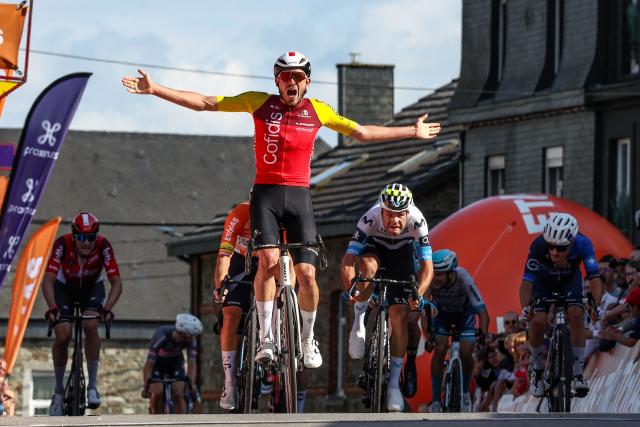 Cofidis' French rider Clement Izquierdo crosses the finish line to win the fifth and final stage of the Tour De Wallonie cycling race, from and back of Bertrix (183,3 km), on July 30, 2025. (Photo by BRUNO FAHY / Belga / AFP) / Belgium OUT