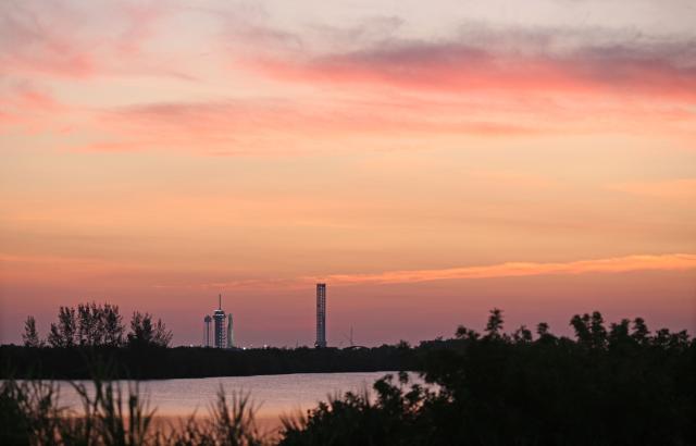 A SpaceX Falcon 9 rocket sits at launch pad LC?39A as the sun begins to rise at the Kennedy Space Center in Cape Canaveral, Florida on July 31, 2025. NASA astronaut and mission commander Zena Cardman, NASA astronaut Mike Fincke, JAXA astronaut Kimiya Yui, and Roscosmos cosmonaut Oleg Platonov will live and work aboard the International Space Station for at least six months. Their launch marks the 11th crew rotation mission to the ISS and the sixth mission for the Crew Dragon Endeavour, making it SpaceX's most-flown Crew Dragon spacecraft. (Photo by Gregg Newton / AFP)