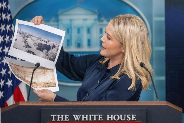 White House Press Secretary Karoline Leavitt displays a rendering for a new White House ballroom during the daily briefing in the Brady Briefing Room of the White House in Washington, DC, on July 31, 2025. (Photo by Jim WATSON / AFP)