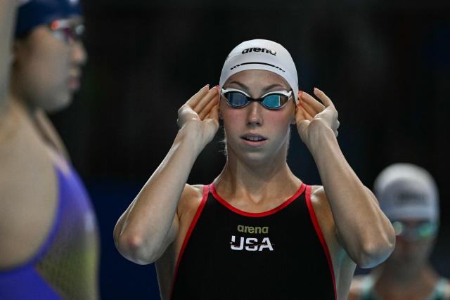 US' swimmer Gretchen Walsh prepares to compete in  a heat of the women's 50m freestyle swimming event during the 2025 World Aquatics Championships in Singapore on August 2, 2025. (Photo by Oli SCARFF / AFP)