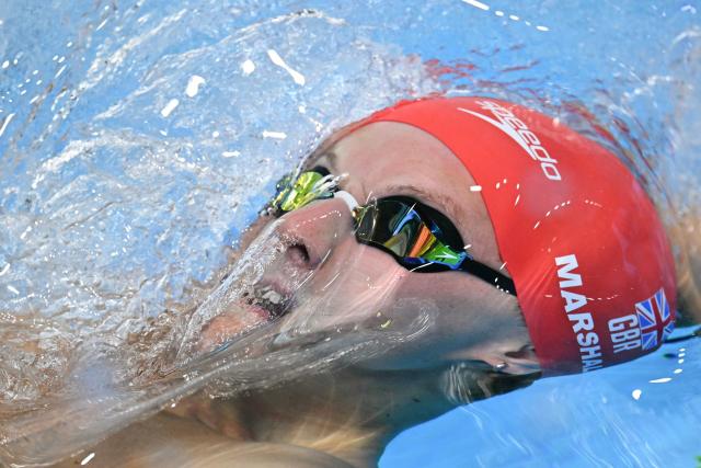 Britain's swimmer Jonathon Marshall competes in  a heat of the men's 50m backstroke swimming event during the 2025 World Aquatics Championships in Singapore on August 2, 2025. (Photo by Oli SCARFF / AFP)
