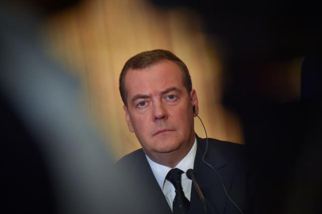 (FILES) Russian Prime Minister Dmitry Medvedev gives a press conference during an official visit to Le Havre, western France on June 24, 2019. A few years ago, he was considered a liberal reformer in the Kremlin. But former Russian President Dmitry Medvedev has stood out since the beginning of the invasion of Ukraine with his provocative statements, which eventually sparked Donald Trump's anger. (Photo by LOIC VENANCE / AFP)