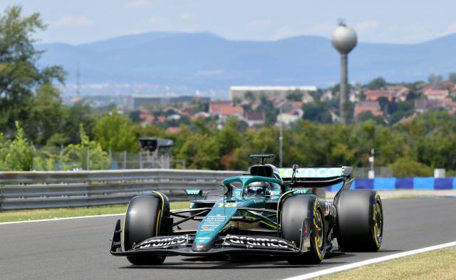 Aston Martin's Canadian driver Lance Stroll races during the third practice session ahead of the Formula One Hungarian Grand Prix at the Hungaroring circuit in Mogyorod near Budapest, Hungary, on August 2, 2025. (Photo by Ferenc ISZA / AFP)