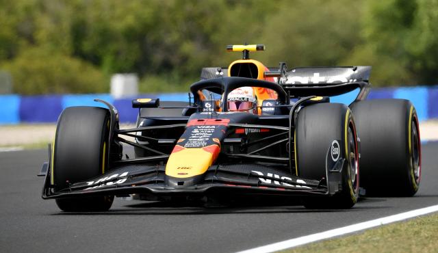 Red Bull's Japanese driver Yuki Tsunoda races during the third practice session ahead of the Formula One Hungarian Grand Prix at the Hungaroring circuit in Mogyorod near Budapest, Hungary, on August 2, 2025. (Photo by Ferenc ISZA / AFP)