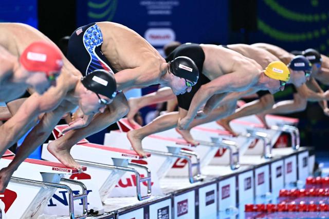 US' swimmer Jack Alexy starts the final of the men's 50m freestyle swimming event during the 2025 World Aquatics Championships in Singapore on August 2, 2025. (Photo by MANAN VATSYAYANA / AFP)