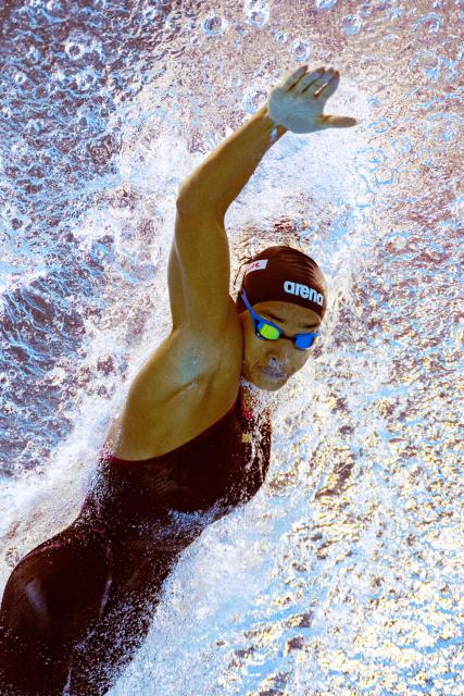 Italy's swimmer Sara Curtis competes in a semi-final of the women's 50m freestyle swimming event during the 2025 World Aquatics Championships in Singapore on August 2, 2025. (Photo by Oli SCARFF / AFP)