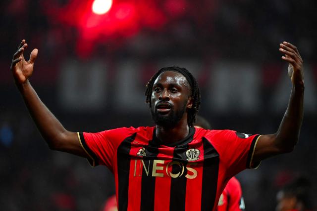 (FILES) Nice's Ivorian forward #29 Evann Guessand celebrates after scoring a goal during the French L1 football match between OGC Nice and Stade Brestois 29 (Brest) at the Riviera Stadium in Nice, south-eastern France, on May 17, 2025. Guessand will not play against Benfica Lisbon on July 6, 2025 at the Riviera Stadium in the first leg of the Champions League third qualifying round, sporting director Florian Maurice said on July 4. (Photo by Sylvain THOMAS / AFP)