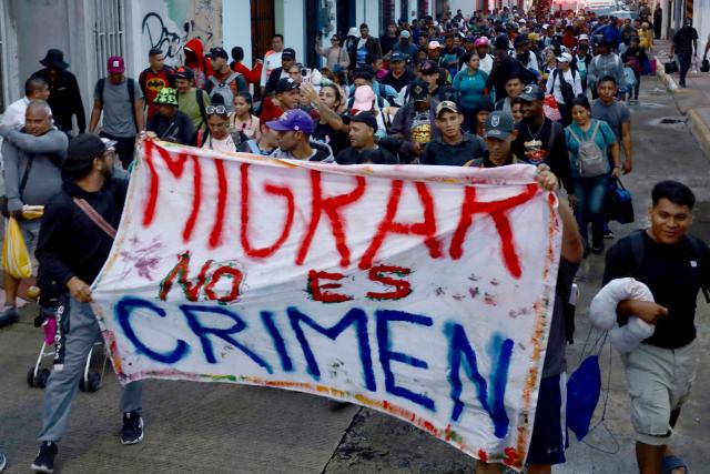 Around 300 migrants of different nationalities set out in a caravan from Tapachula, Chiapas state, Mexico, on August 6, 2025, heading to Mexico City to seek legal residency permits before continuing toward the US border. (Photo by Jose Torres / AFP)
