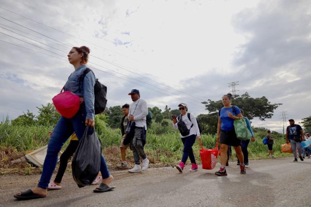Around 300 migrants of different nationalities set out in a caravan from Tapachula, Chiapas state, Mexico, on August 6, 2025, heading to Mexico City to seek legal residency permits before continuing toward the US border. (Photo by Jose Torres / AFP)