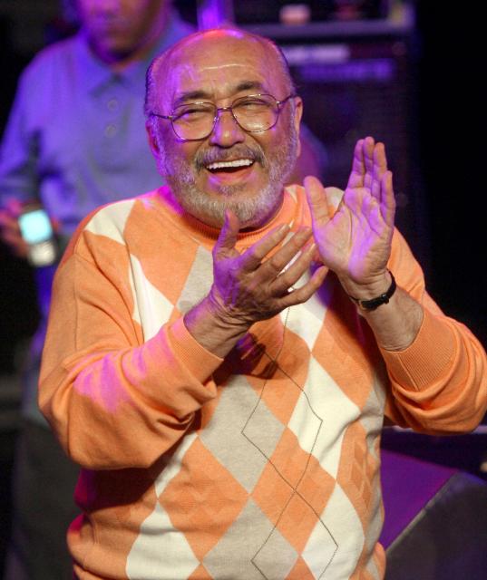 (FILES) US pianist Eddie Palmieri cheers on August 2, 2009 at the Theatre de la Mer in Sete southeastern France, during the music Festival Fiest'A. Eddie Palmieri, the legendary Latin music pianist and bandleader who helped ignite New York’s salsa scene, died at 88 at his New Jersey home on August 6, according to a statement on his social media. (Photo by RAYMOND ROIG / AFP)