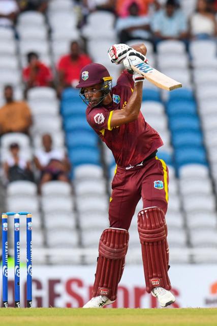 Roston Chase of West Indies hits 4 during the second One Day International (ODI) cricket match between West Indies and Pakistan at Brian Lara Cricket Academy in Tarouba, San Fernando, Trinidad and Tobago on August 10, 2025. (Photo by Randy Brooks / AFP)