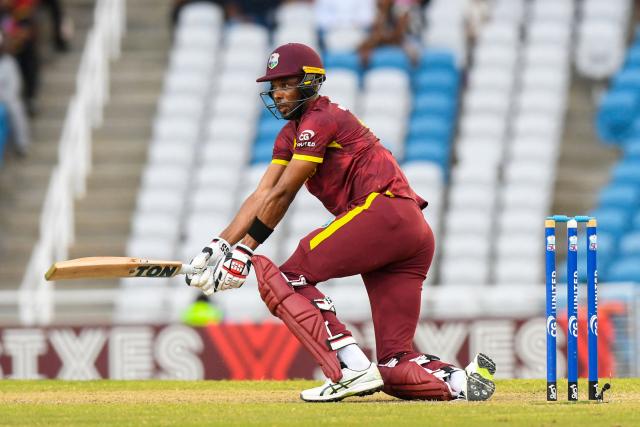 Roston Chase of West Indies hits 4 during the second One Day International (ODI) cricket match between West Indies and Pakistan at Brian Lara Cricket Academy in Tarouba, San Fernando, Trinidad and Tobago on August 10, 2025. (Photo by Randy Brooks / AFP)