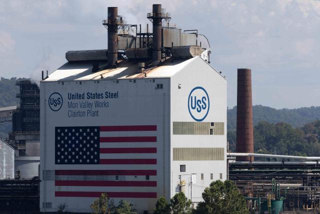 The US Steel logo is seen on their Clairton Coke Works plant following an explosion at the plant in Clairton, Pennsylvania, on August 11, 2025. At least one person died and dozens were wounded on August 11 after blasts at the US Steel plant in the state of Pennsylvania, officials said. "Multiple explosions occurred today at U.S. Steel Clairton Coke Works," the state's Governor Josh Shapiro said in a post on X, naming a plant some 15 miles (25 kilometers) outside the city of Pittsburgh. (Photo by Rebecca DROKE / AFP)