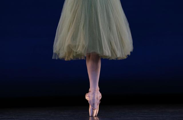 Emma Von Enck (pointe shoes detail), principal dancer with New York City Ballet, performs "Four Bagatelles" during a dress rehearsal for the Ballet Festival: Jerome Robbins, curated by Tiler Peck, at the Joyce Theater in New York on August 12, 2025. (Photo by TIMOTHY A. CLARY / AFP)