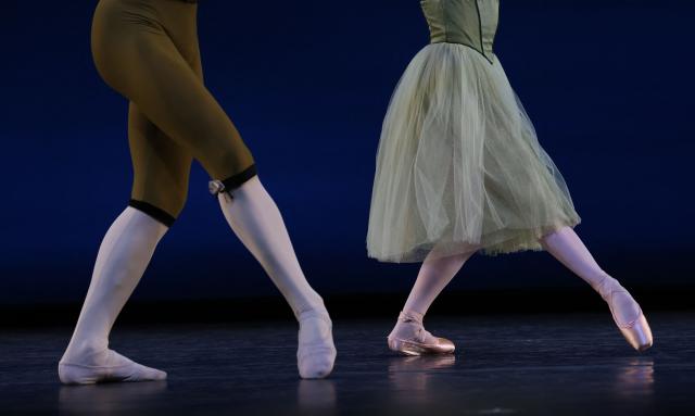 Emma Von Enck, principal dancer with New York City Ballet (R), and David Gabriel, soloist with the company, perform "Four Bagatelles" during a dress rehearsal for the Ballet Festival: Jerome Robbins, curated by Tiler Peck, at the Joyce Theater in New York on August 12, 2025. (Photo by TIMOTHY A. CLARY / AFP)