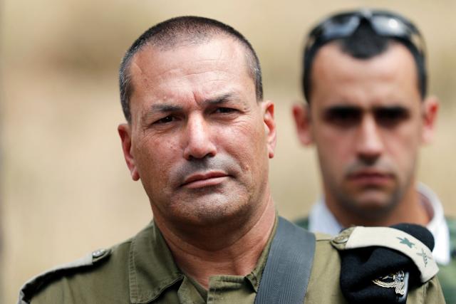 (FILES) Israeli army major general Eyal Zamir looks on as he stands near the Israel-Gaza border in the southern kibbutz of Nahal Oz on April 20, 2018. The Israeli military said in a statement issuded on August 13, 2025 that Zamir, the armed forces chief lieutenant general, had approved the "framework" for a new offensive in the Gaza Strip, days after the security cabinet called for the seizure of Gaza City. (Photo by THOMAS COEX / AFP)