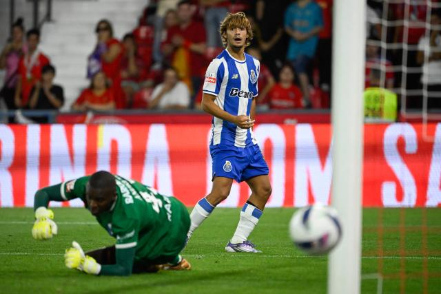 FC Porto's Portuguese midfielder #86 Rodrigo Mora reacts after failing to score during the Portuguese League football match between Gil Vicente FC and FC Porto at the Cidade de Barcelos stadium in Barcelos, Portugal on August 18, 2025. (Photo by MIGUEL RIOPA / AFP)