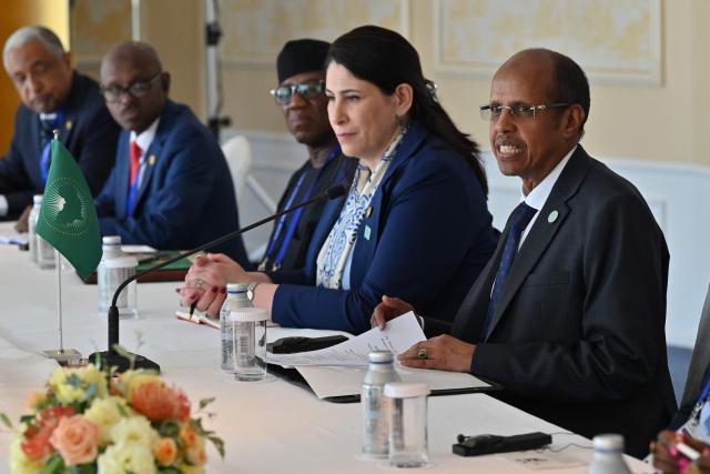 Chairperson of the African Union (AU), Angola's President Joao Lourenco (R), speaks during his bilateral meeting with Japan's Prime Minister Shigeru Ishiba (not pictured) on the sidelines of the 9th Tokyo International Conference on African Development (TICAD 9) in Yokohama, Kanagawa prefecture, south of Tokyo on August 20, 2025. (Photo by Richard A. Brooks / AFP)