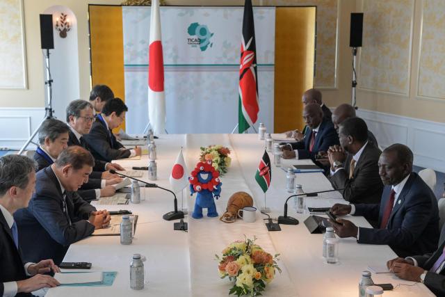 Japan's Prime Minister Shigeru Ishiba (2nd L) speaks with Kenya's President William Ruto (R) at the start of their bilateral meeting on the sidelines of the 9th Tokyo International Conference on African Development (TICAD 9) in Yokohama, Kanagawa prefecture, south of Tokyo on August 20, 2025. (Photo by Richard A. Brooks / AFP)