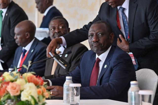 Kenya's President William Ruto (R) arrives for a bilateral meeting with Japan's Prime Minister Shigeru Ishiba (not pictured) on the sidelines of the 9th Tokyo International Conference on African Development (TICAD 9) in Yokohama, Kanagawa prefecture, south of Tokyo on August 20, 2025. (Photo by Richard A. Brooks / AFP)