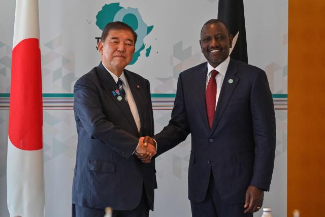 Japan's Prime Minister Shigeru Ishiba (L) meets with Kenya's President William Ruto (R) at their bilateral meeting on the sidelines of the 9th Tokyo International Conference on African Development (TICAD 9) in Yokohama, Kanagawa prefecture, south of Tokyo on August 20, 2025. (Photo by Richard A. Brooks / AFP)