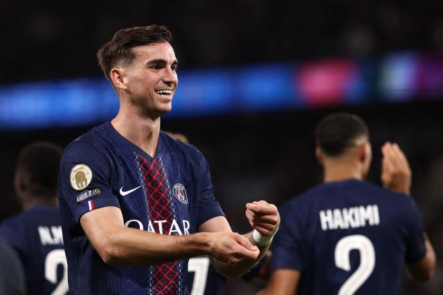 Paris Saint-Germain's Spanish midfielder #08 Fabian Ruiz celebrates scoring his team's first goal during the French L1 football match between Paris Saint-Germain (PSG) and Angers SCO at the Parc des Princes Stadium in Paris on August 22, 2025. (Photo by FRANCK FIFE / AFP)