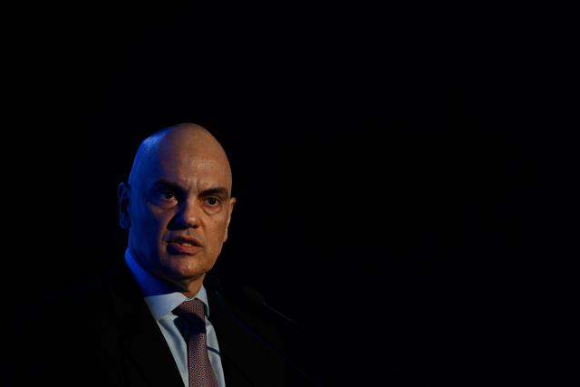 Brazil's Supreme Court Justice Minister Alexandre de Moraes speaks at the 24th LIDE Business Forum in Rio de Janeiro, Brazil on August 22, 2025. (Photo by MAURO PIMENTEL / AFP)