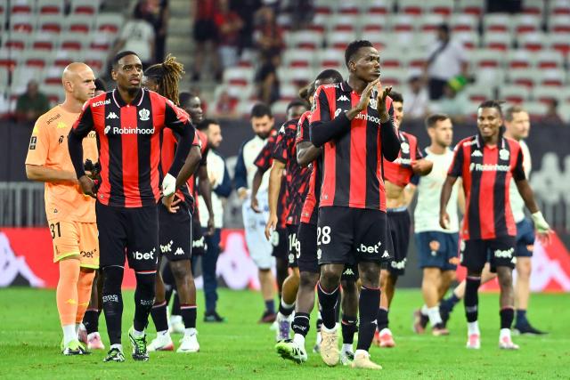 Nice' Sierra Leonean defender #28 Juma Bah acknowledges the supporters after the team's 3-1 win over Auxerre during the French L1 football match between OGC Nice and AJ Auxerre at the Allianz Riviera Stadium in Nice, south-eastern France, on August 23, 2025.  (Photo by Frederic DIDES / AFP)