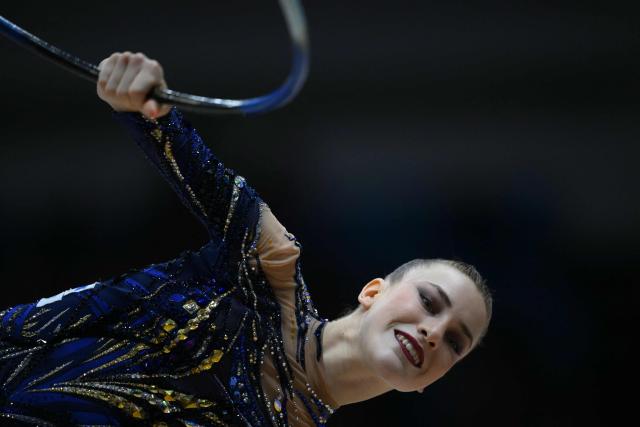 Germany's Darja Varfolomeev competes in the individual hoop final of the 41st FIG Rhythmic Gymnastics World Championships in Rio de Janeiro, Brazil on August 24, 2025. (Photo by Mauro PIMENTEL / AFP)