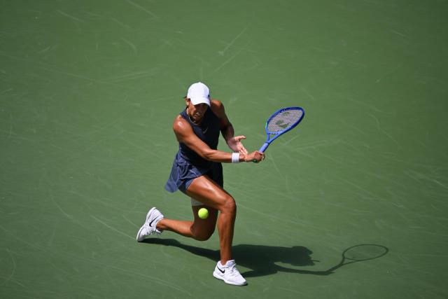 USA's Madison Keys plays a backhand return to Mexico's Renata Zarazua during their women's singles first round tennis match on day two of the US Open tennis tournament at the USTA Billie Jean King National Tennis Center in New York City, on August 25, 2025. (Photo by ANGELA WEISS / AFP)