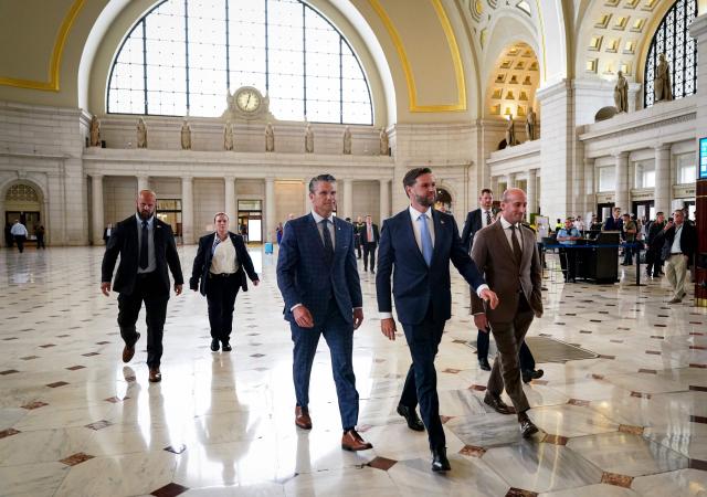 (FILES) US Defense Secretary Pete Hegseth (C) US Vice President JD Vance (2nd-R) and US White House deputy chief of staff Stephen Miller (R) arrive to greet members of the National Guard at Union Station in Washington, DC on August 20, 2025. According to US media reports on August 27, the US Department of Transportation is planning to take over management of Union Station in Washington, DC. (Photo by AL DRAGO / POOL / AFP)